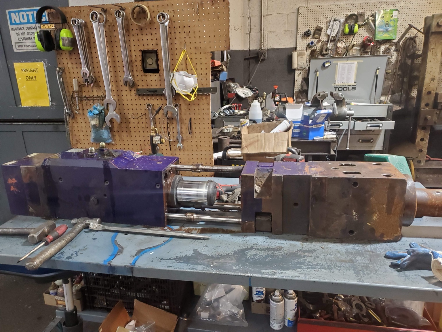 Hydraulic breaker opened for internal service