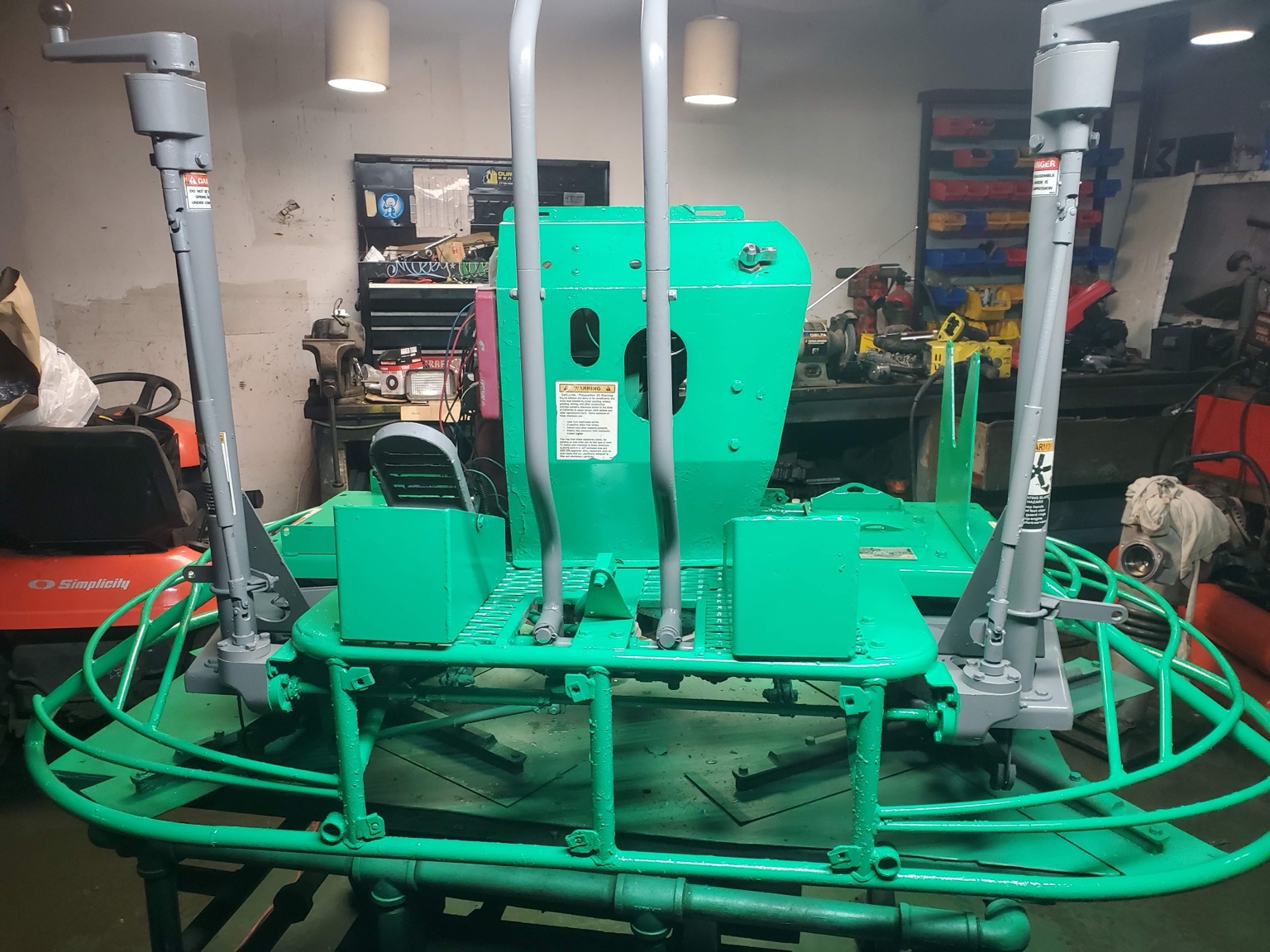 Ride-on power trowel after service