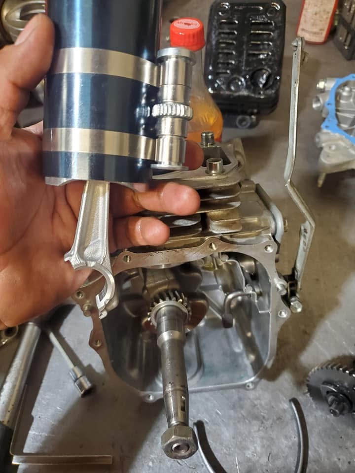 Small engine piston and crankcase service